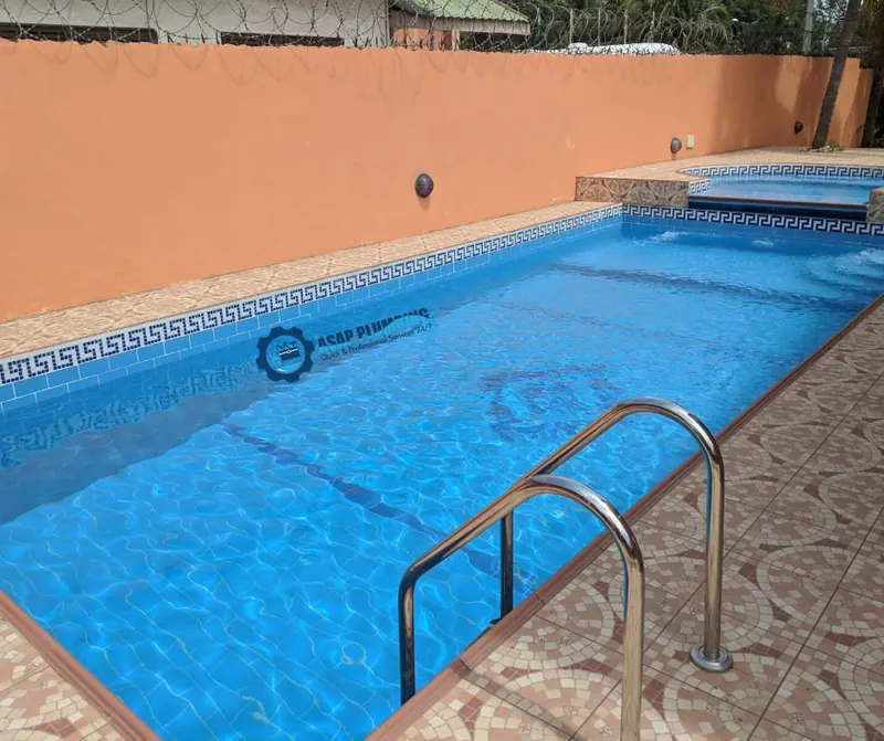 Finished swimming pool with plumbing and filtration installed